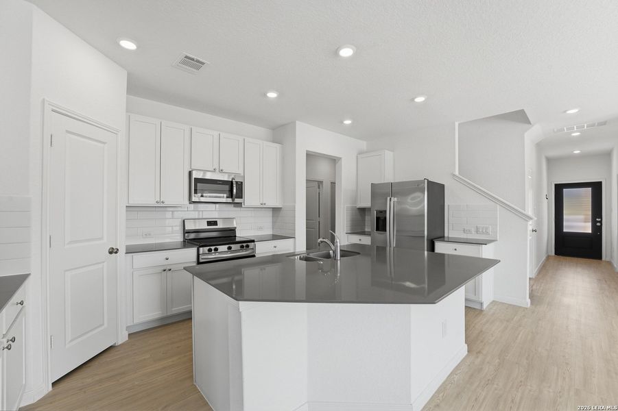 Furnished interior view inside a new home in Guadalupe Heights, Seguin (Image 10).