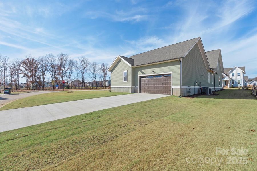 Front exterior of a new home in Riverwalk, Rock Hill, SC, highlighting curb appeal (Image 19).