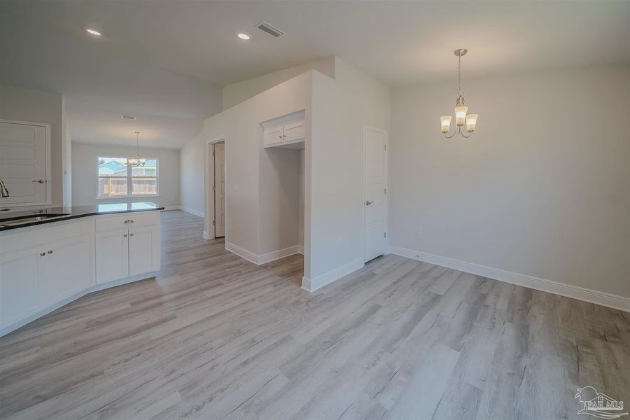 Spacious, unfurnished interior of a new home in Pine Top, Cantonment (Image 9).