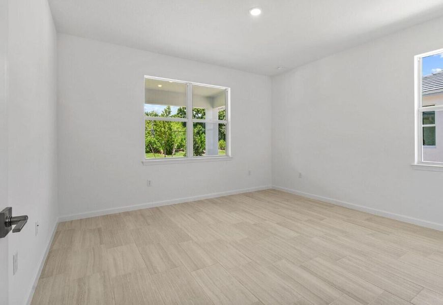 Furnished interior view inside a new home in Costa Pointe, Vero Beach (Image 12).