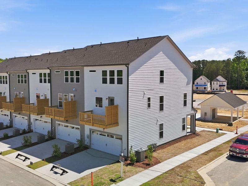 Exterior details and patio area of a home in Forestville Yard Townhomes, Knightdale (Image 3). Exterior details and patio area of a home in Forestville Yard Townhomes, Knightdale (Image 3).
