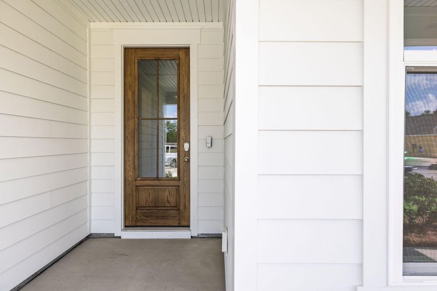 Exterior details and patio area of a home in , Charleston (Image 3).