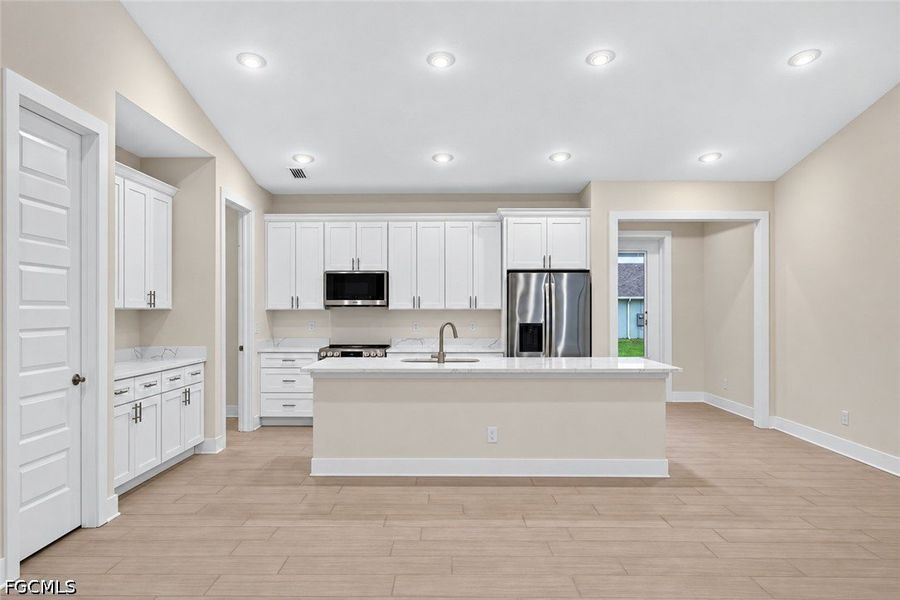 Furnished interior view inside a new home in Cape Coral, Cape Coral (Image 6). Furnished interior view inside a new home in Cape Coral, Cape Coral (Image 6).