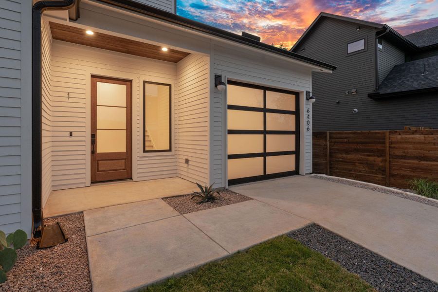 Front exterior of a new home in , Austin, TX, highlighting curb appeal (Image 1). Front exterior of a new home in , Austin, TX, highlighting curb appeal (Image 1).