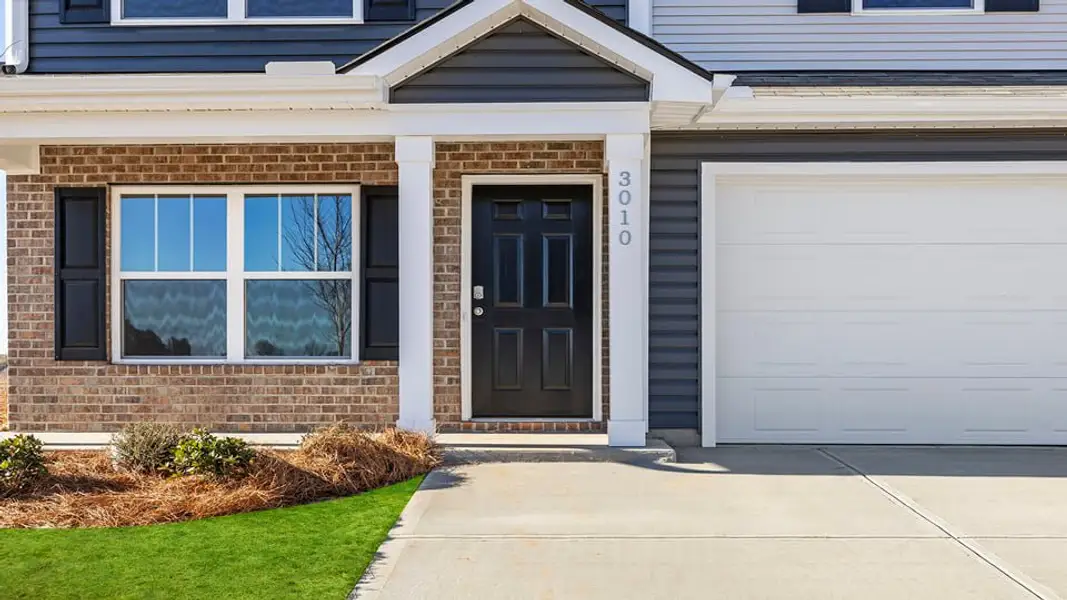 Exterior details and patio area of a home in Harper Ridge, Roebuck (Image 4).
