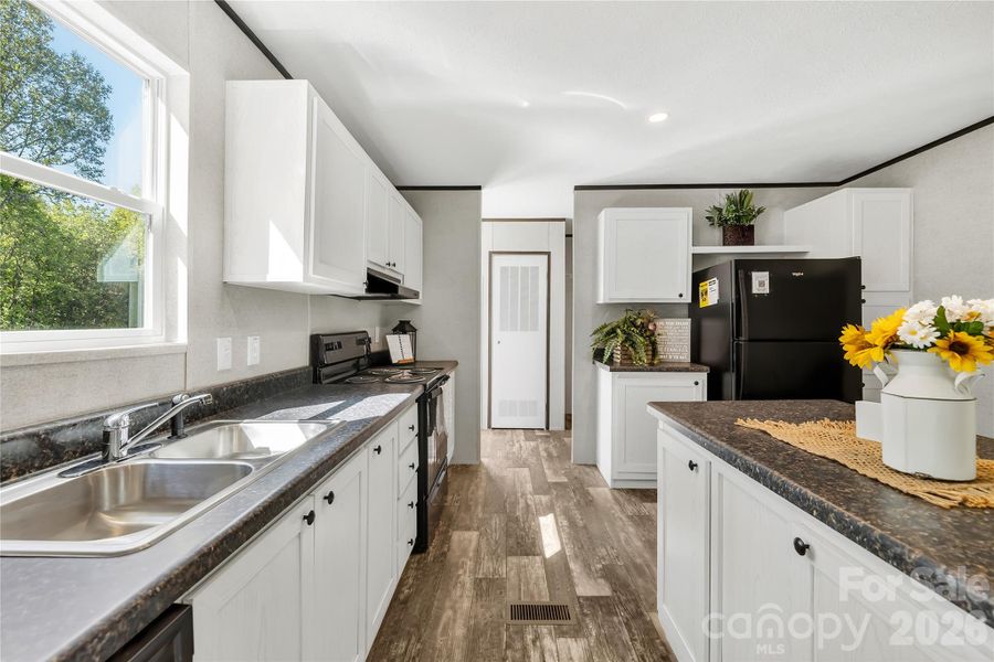 Furnished interior view inside a new home in , Thurmond (Image 8).