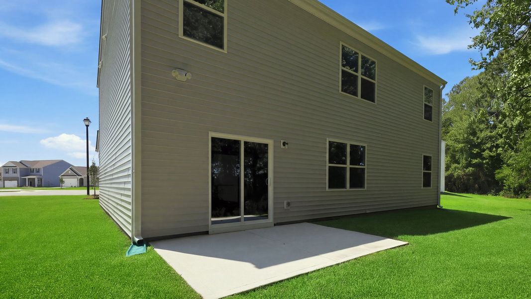 Exterior details and patio area of a home in Villa Grande, Winterville (Image 20).