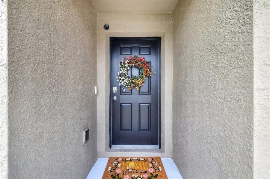 Exterior details and patio area of a home in Sunset Hills, Summerfield (Image 24).