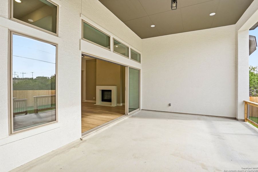 Exterior details and patio area of a home in Kinder Ranch 70's, San Antonio (Image 4).