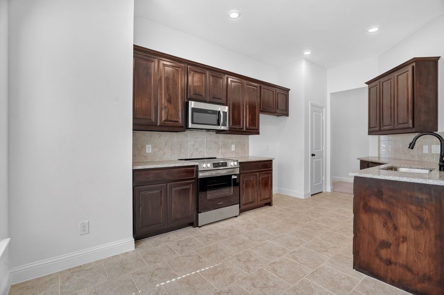 Furnished interior view inside a new home in Craftsman's Corner, Cleburne (Image 6).