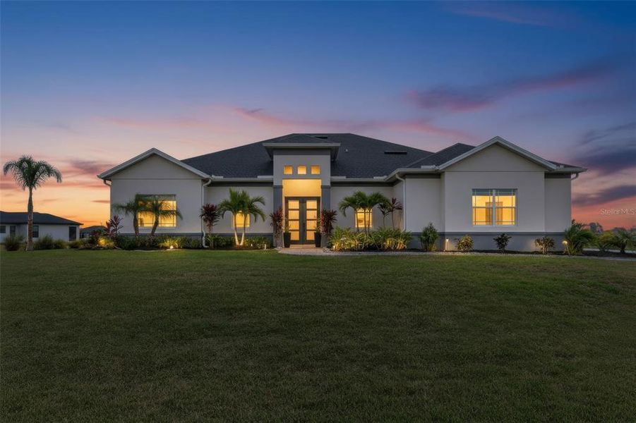 Front exterior of a new home in , Cape Coral, FL, highlighting curb appeal (Image 25).