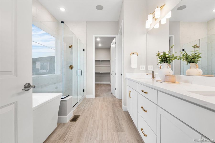 Furnished interior view inside a new home in Hilltop at Inspiration, Aurora (Image 23).