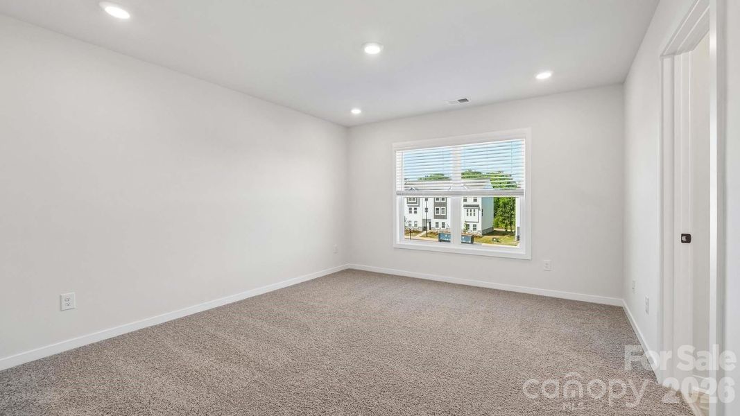 Spacious, unfurnished interior of a new home in The Townes at Lake Norman, Mooresville (Image 20).