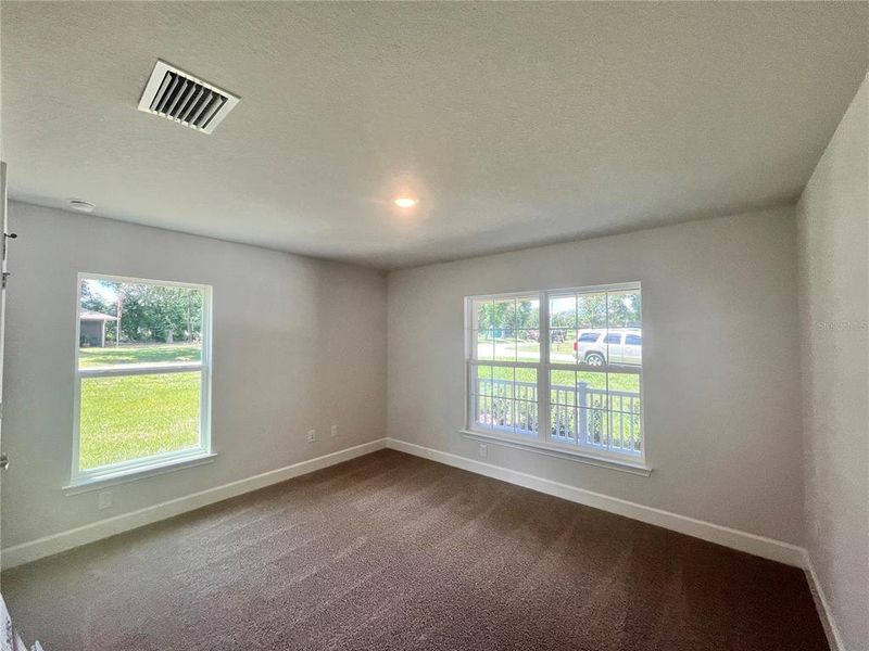 Spacious, unfurnished interior of a new home in Orange Blossom Hills, Summerfield (Image 12).