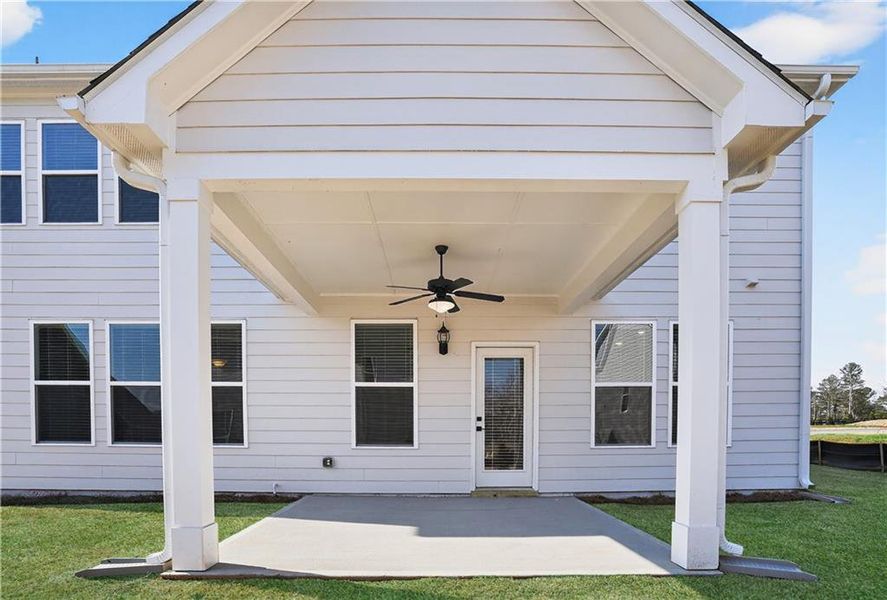 Exterior details and patio area of a home in The Fairways at Mirror Lake, Villa Rica (Image 27).