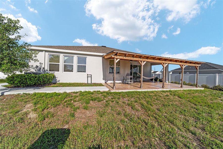 Exterior details and patio area of a home in Brookhaven, Ocala (Image 35).