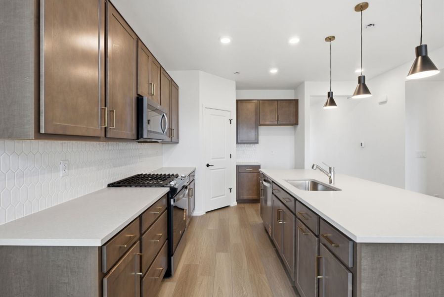 Furnished interior view inside a new home in Harvest Crossing, Aurora (Image 10).