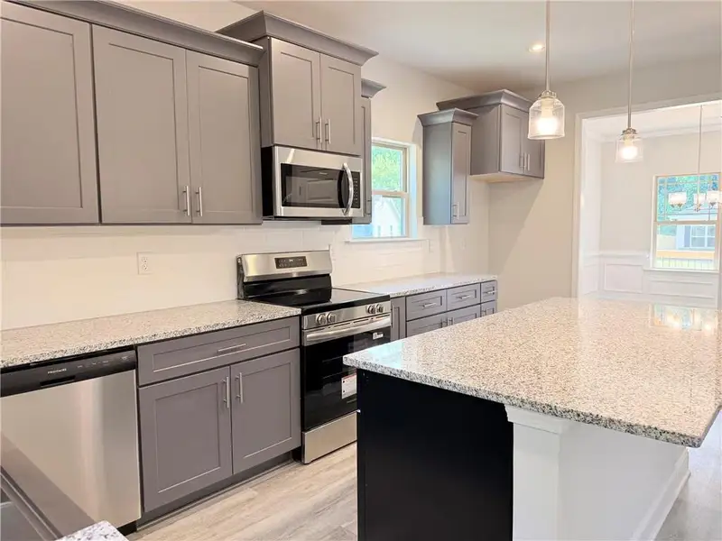 Furnished interior view inside a new home in Magnolia Villas, Cornelia (Image 6).