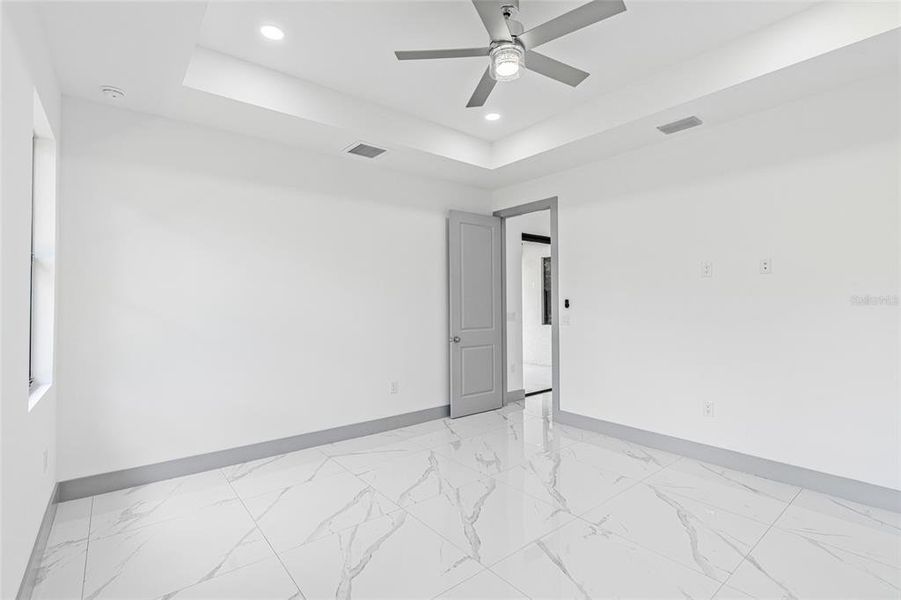 Spacious, unfurnished interior of a new home in , Port Charlotte (Image 38).