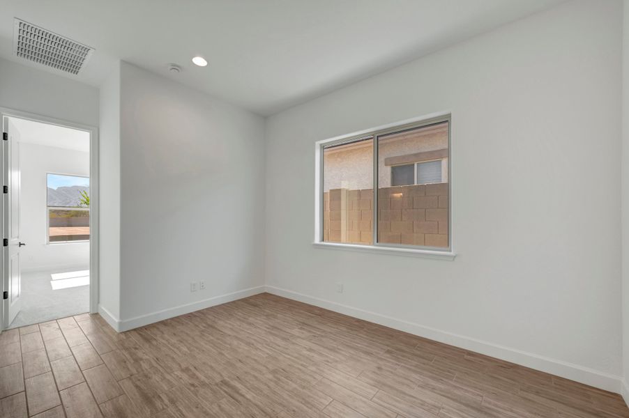 Spacious, unfurnished interior of a new home in Sentiero at Windrose, Waddell (Image 14).