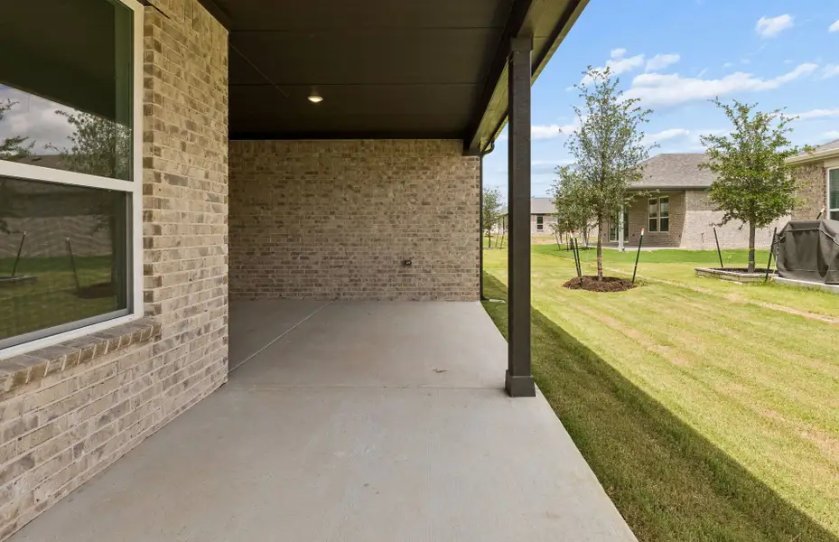 Exterior details and patio area of a home in Del Webb at Trinity Falls, McKinney (Image 2).