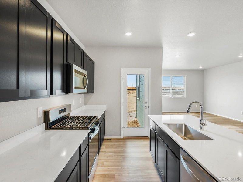 Furnished interior view inside a new home in Lake Bluff, Greeley (Image 8).