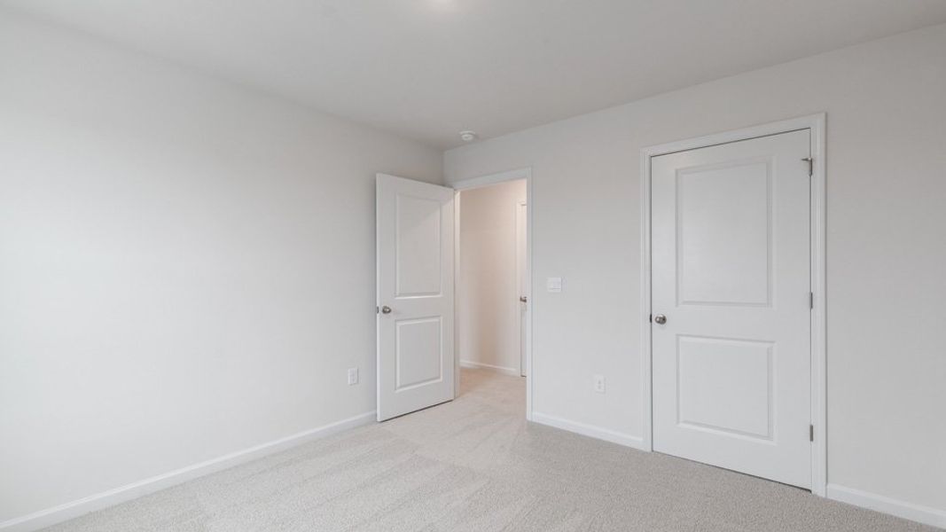 Representative unfurnished interior of a home built from the Savannah by D.R. Horton in The Meadows at Kinsley, Jamestown (Image 14).