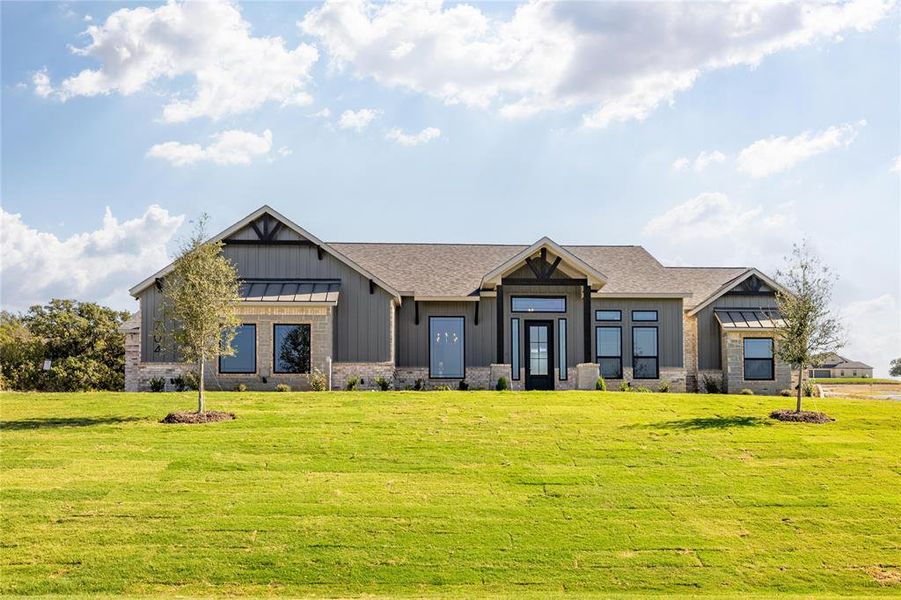 View of front facade with a front lawn