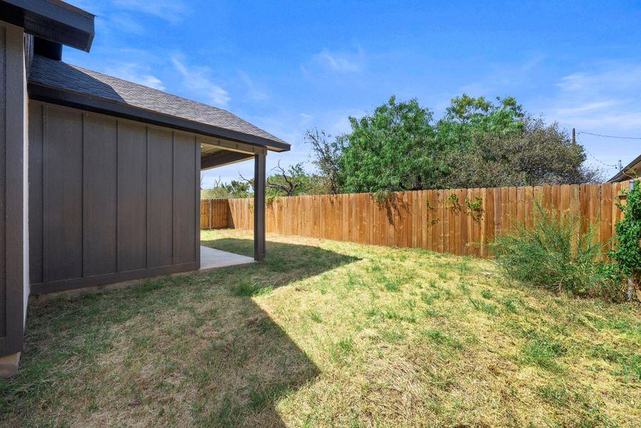 Exterior details and patio area of a home in , Granite Shoals (Image 4).