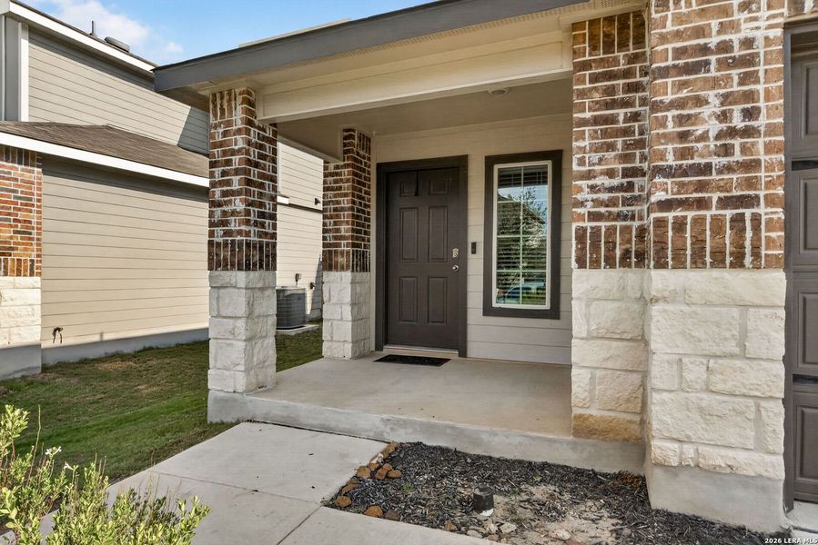 Exterior details and patio area of a home in Preserve at Medina, Von Ormy (Image 22).