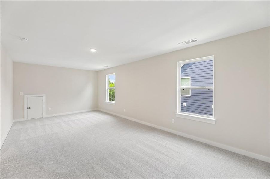 Spacious, unfurnished interior of a new home in The Park at Brighton, Locust Grove (Image 28).