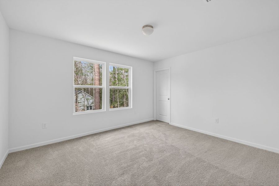 Spacious, unfurnished interior of a new home in Lake Royale, Louisburg (Image 20).