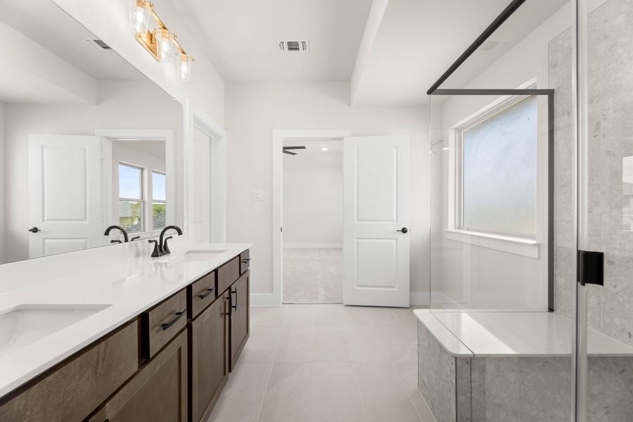 Image 14 representing the Holly by Tri Pointe Homes in Treeline, Justin, TX.