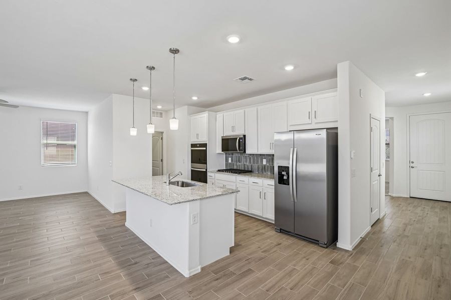 Furnished interior view inside a new home in Mandarina Reserve, Marana (Image 6).