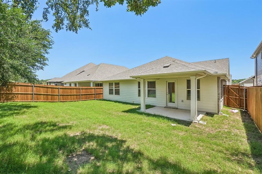 Exterior details and patio area of a home in Stella Hills, Denton (Image 23).
