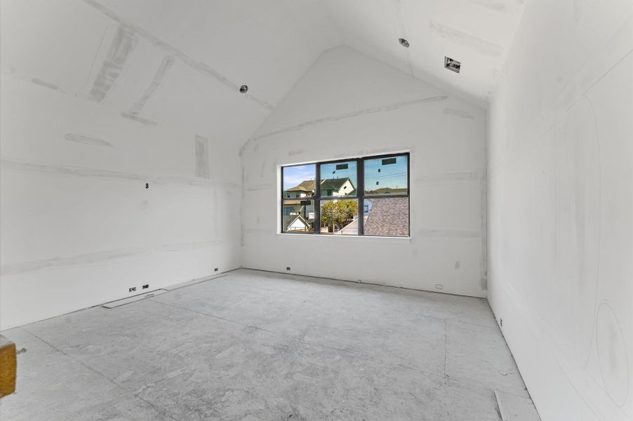 Cathedral ceiling in secondary bedroom.