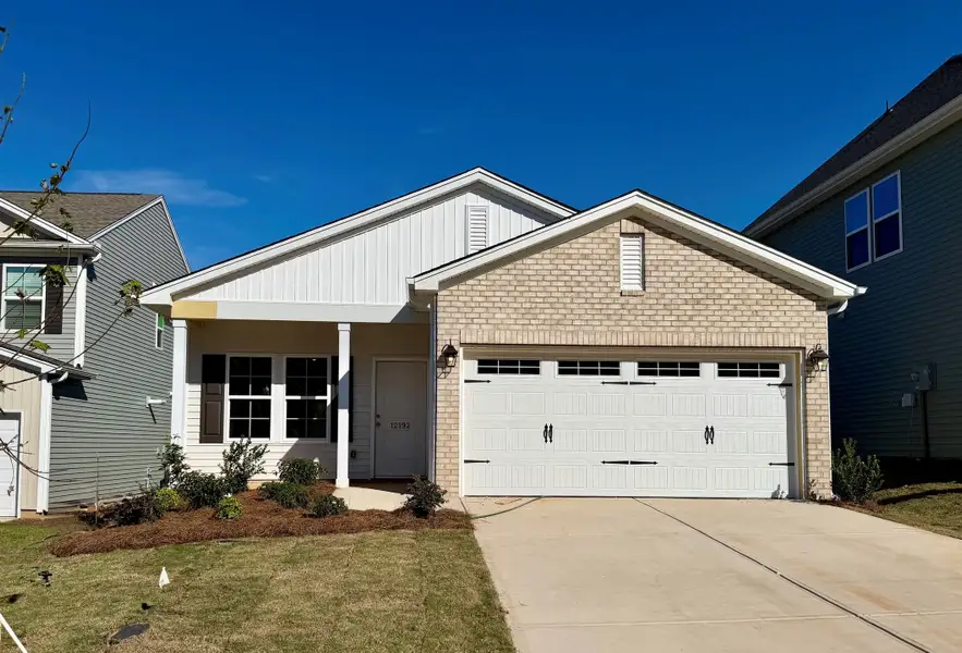 Front exterior of a new home in Richmond Hill, Inman, SC, highlighting curb appeal (Image 1). Front exterior of a new home in Richmond Hill, Inman, SC, highlighting curb appeal (Image 1).