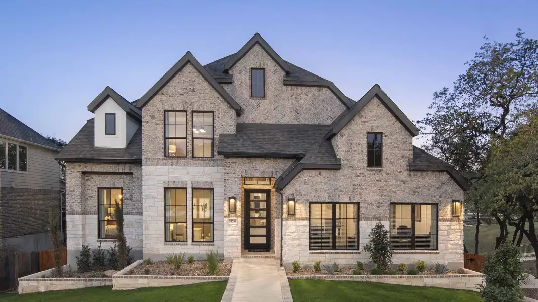 Representative exterior photo of a completed home built from the 3399W by Perry Homes in Briarley, Montgomery, TX (Image 27).