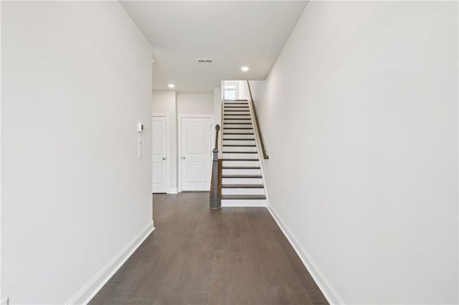 Spacious, unfurnished interior of a new home in Ward's Crossing Townhomes, Johns Creek (Image 27).