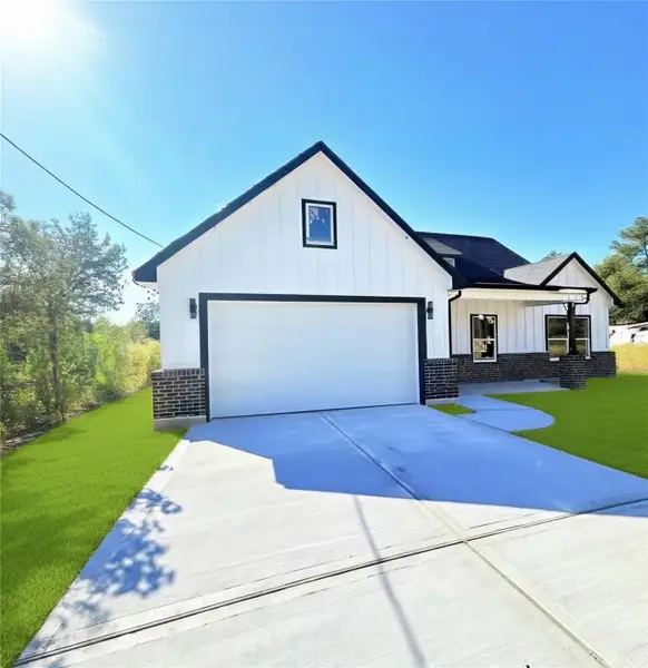 Front exterior of a new home in , Cleveland, TX, highlighting curb appeal (Image 1). Front exterior of a new home in , Cleveland, TX, highlighting curb appeal (Image 1).