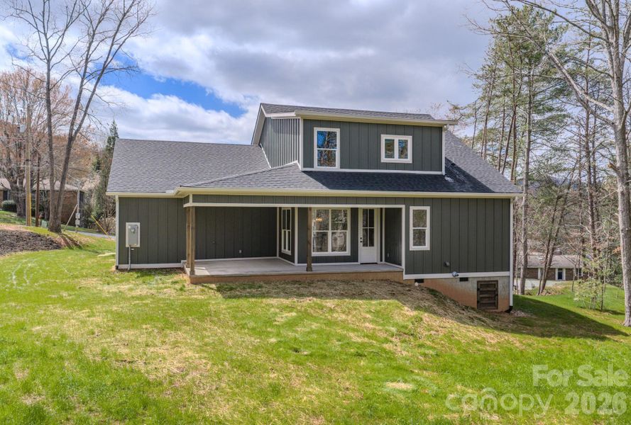 Level rear yard would make a great area for gardening or play.