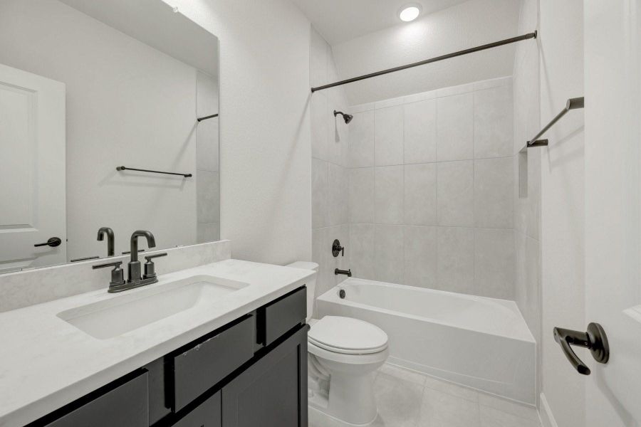Furnished interior view inside a new home in Sienna - Grove Collection, Missouri City (Image 8).