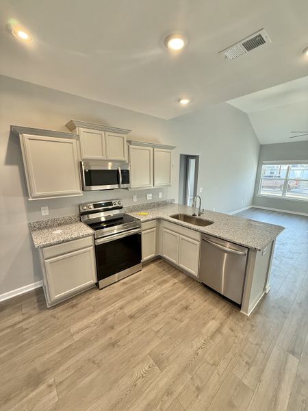 Furnished interior view inside a new home in Stonehenge, Manchester (Image 3).