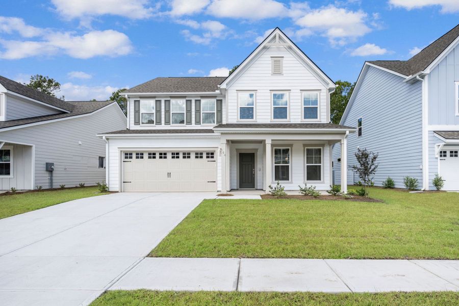 Front exterior of a new home in Waterways, Richmond Hill, GA, highlighting curb appeal (Image 29).