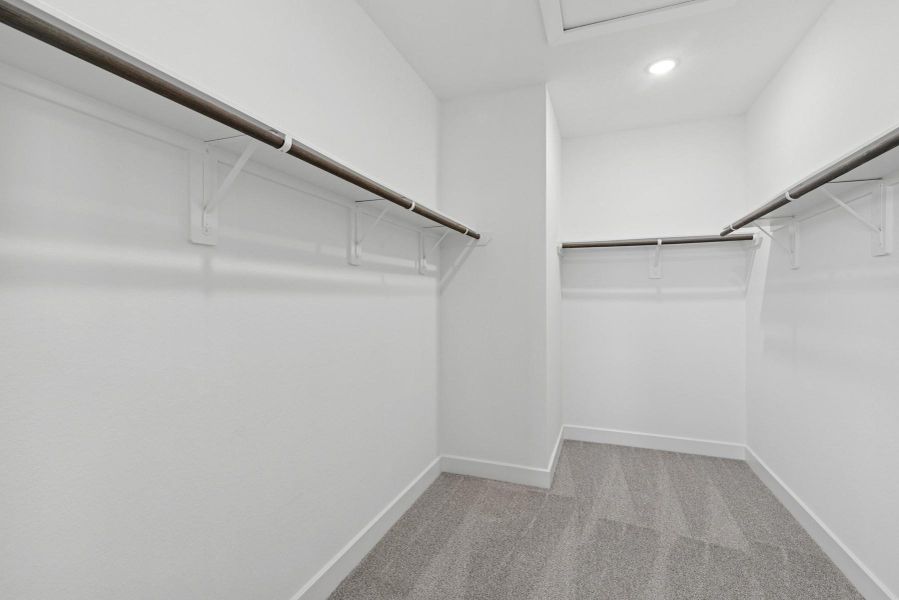 Primary walk-in closet (*Photo not of actual home and used for illustration purposes only.)