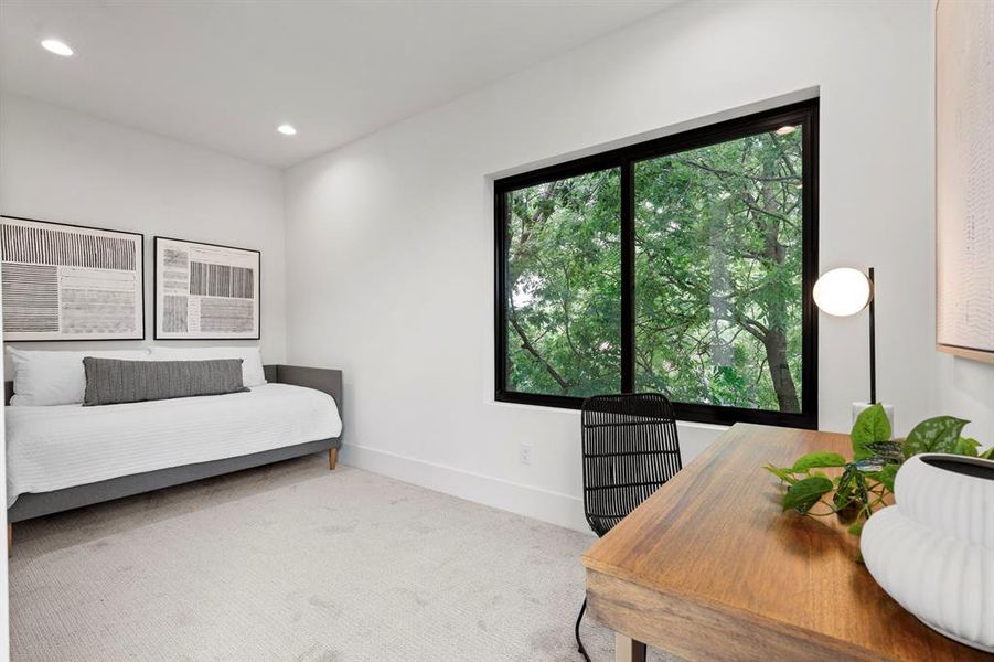 Bedroom with carpet floors and recessed lighting Bedroom with carpet floors and recessed lighting