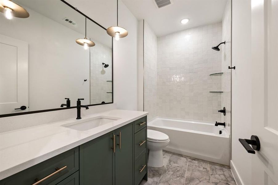 Beautiful and spacious, friends and family will love this main floor guest bath. Beautiful and spacious, friends and family will love this main floor guest bath.
