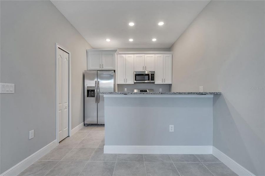 Furnished interior view inside a new home in , Kissimmee (Image 3). Furnished interior view inside a new home in , Kissimmee (Image 3).