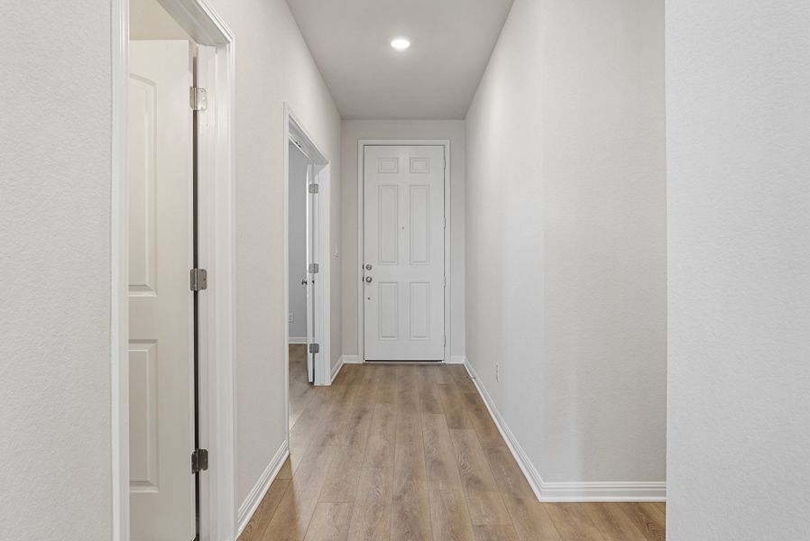 Representative unfurnished interior of a home built from the Somerville by Ashton Woods in Willow Springs, Buda (Image 20).