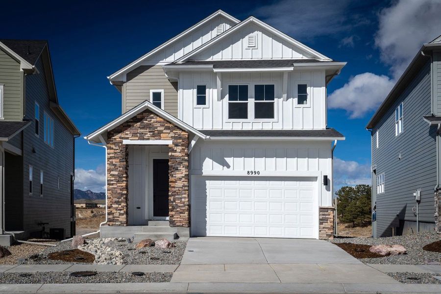 Representative exterior photo of a completed home built from the The Terra Linda by David Weekley Homes in Revel Crossing at Wolf Ranch - The Panorama Collection, Colorado Springs, CO (Image 2). Representative exterior photo of a completed home built from the The Terra Linda by David Weekley Homes in Revel Crossing at Wolf Ranch - The Panorama Collection, Colorado Springs, CO (Image 2).